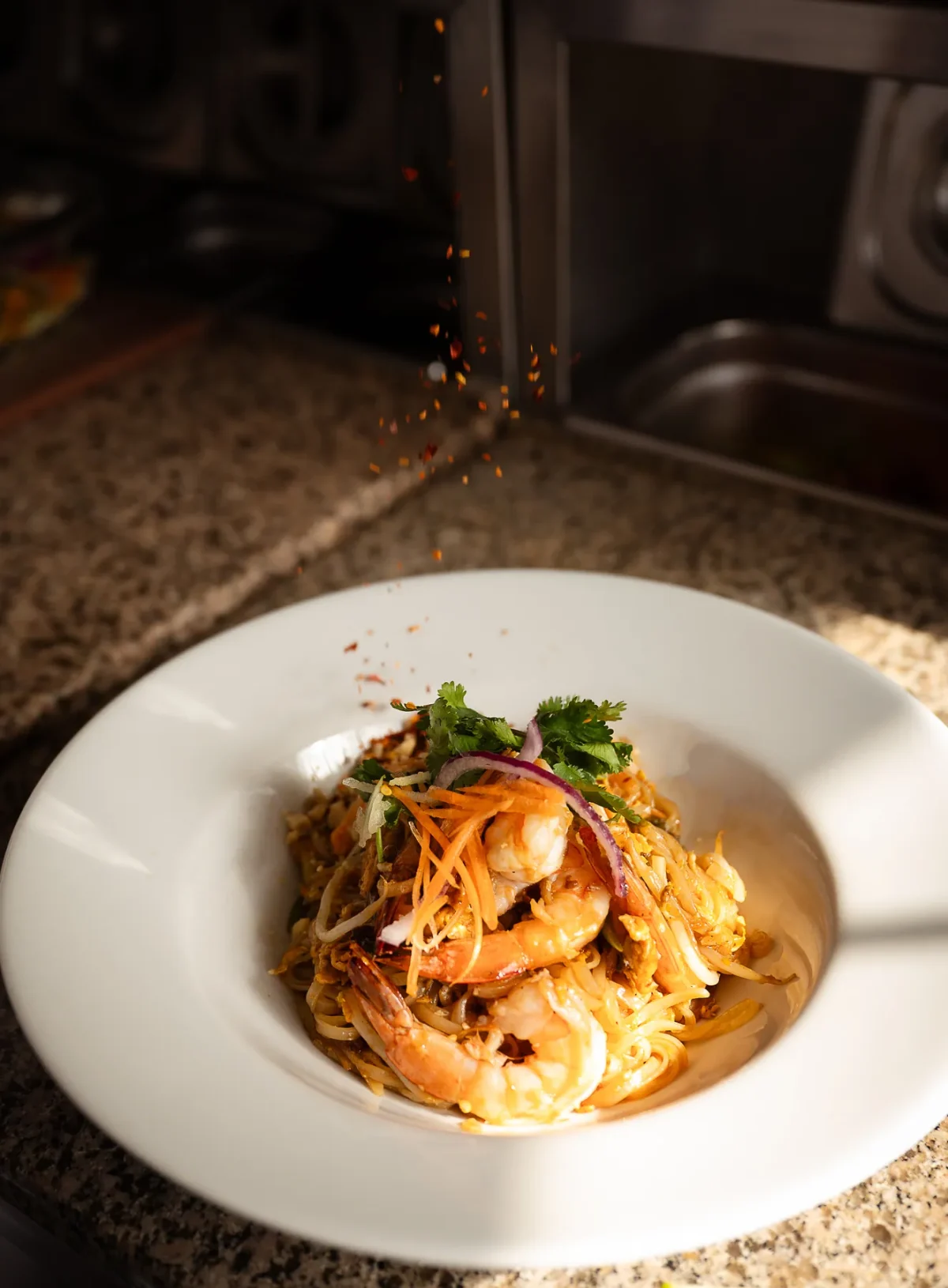 Pad Thai with prawns, noodles and fresh herbs