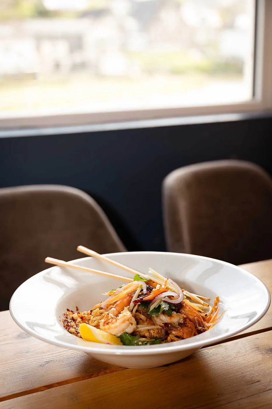 A Thai prawn special served at a window table overlooking the river